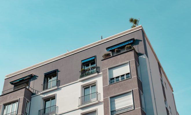 white concrete building under blue sky during daytime